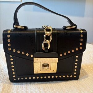 Chic Black Mini Bag with Gold Accents